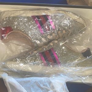 Silver ace glitter Gucci sneakers.